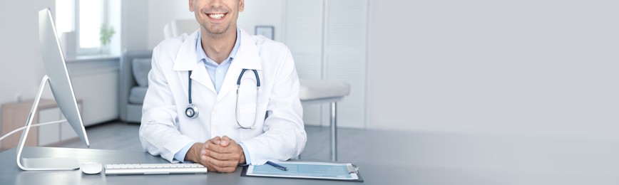 Image of Young doctor at table in hospital, space for text. Banner design