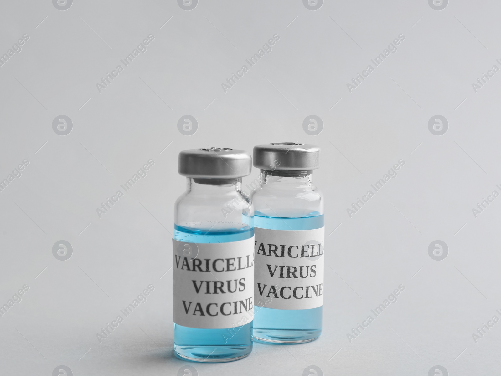 Photo of Chickenpox vaccine on light grey background. Varicella virus prevention