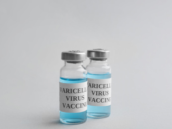 Chickenpox vaccine on light grey background. Varicella virus prevention