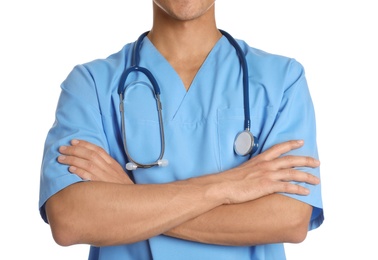 Male doctor with stethoscope on white background, closeup. Medical object