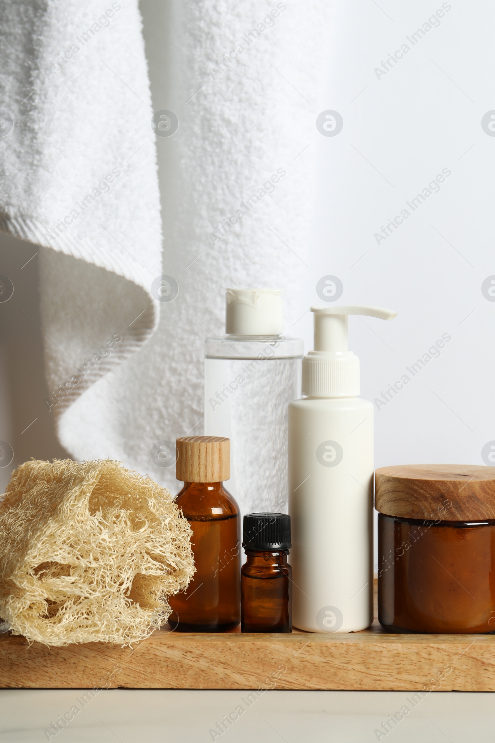 Photo of Different bath accessories and personal care products on light table