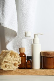 Photo of Different bath accessories and personal care products on light table