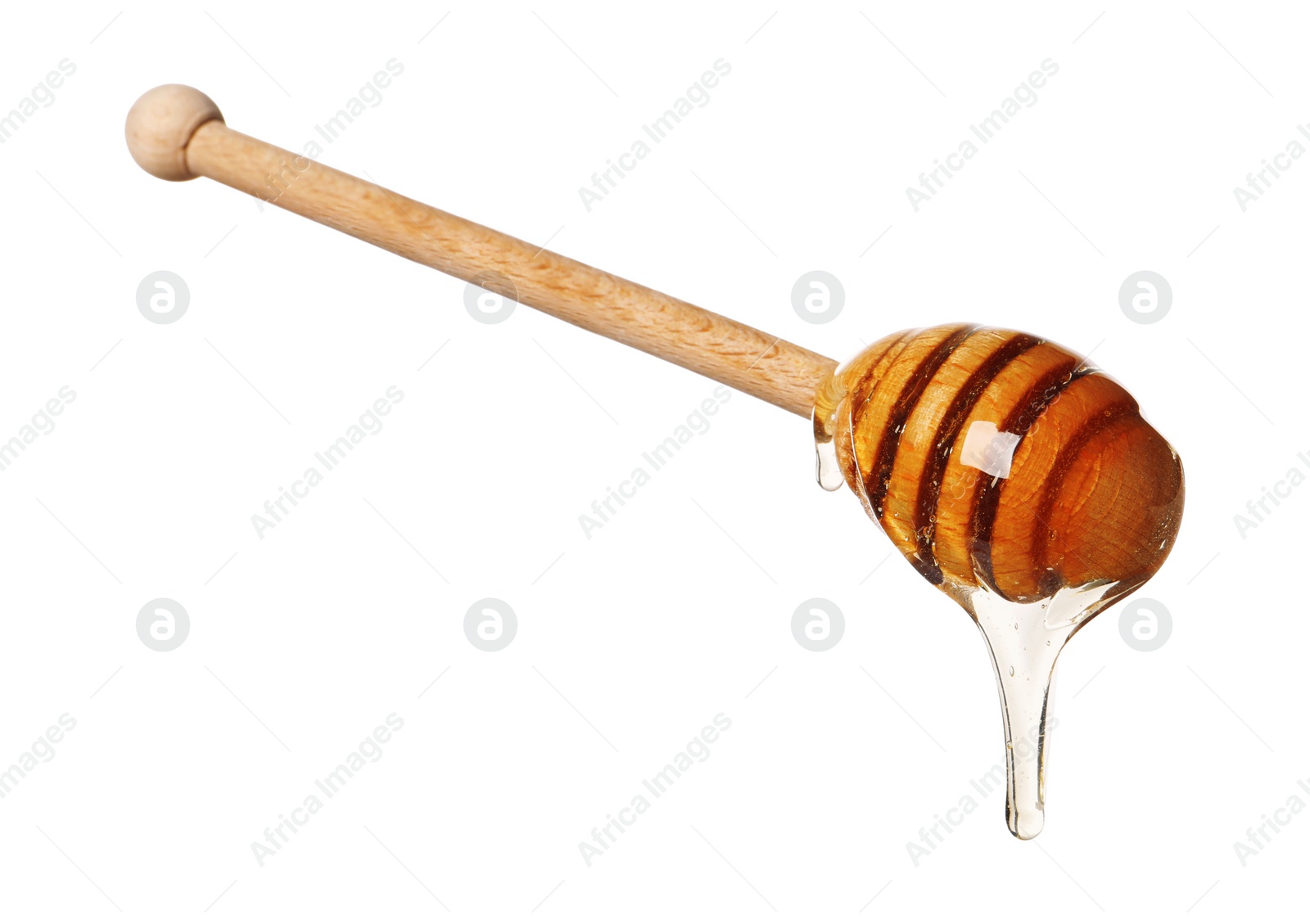 Photo of Natural honey dripping from dipper on white background