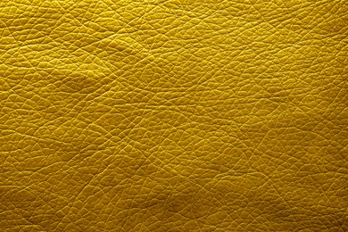 Image of Golden textured surface as background, closeup view