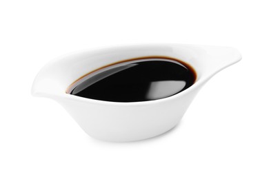 Photo of Bowl of soy sauce isolated on white