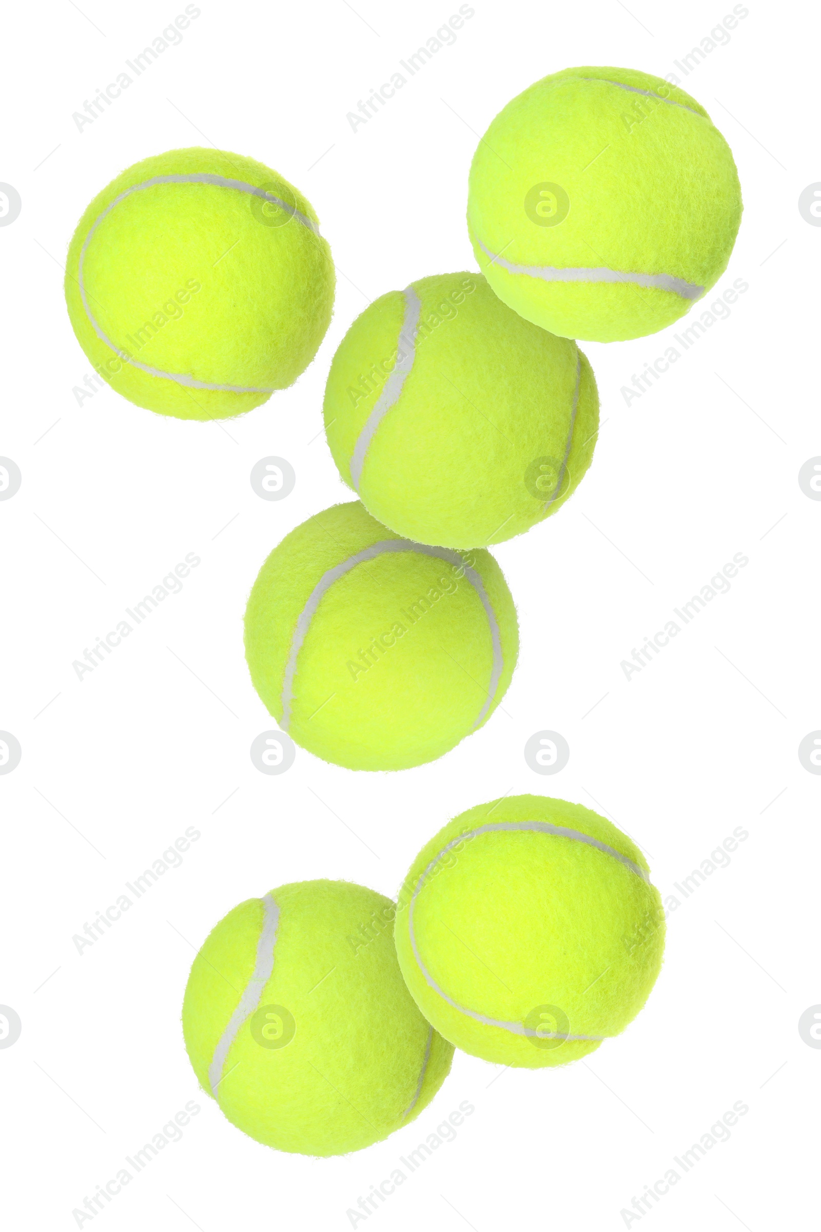 Image of Many tennis balls flying on white background