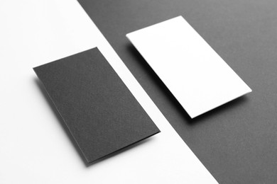 Photo of Blank business cards on color background. Mockup for design