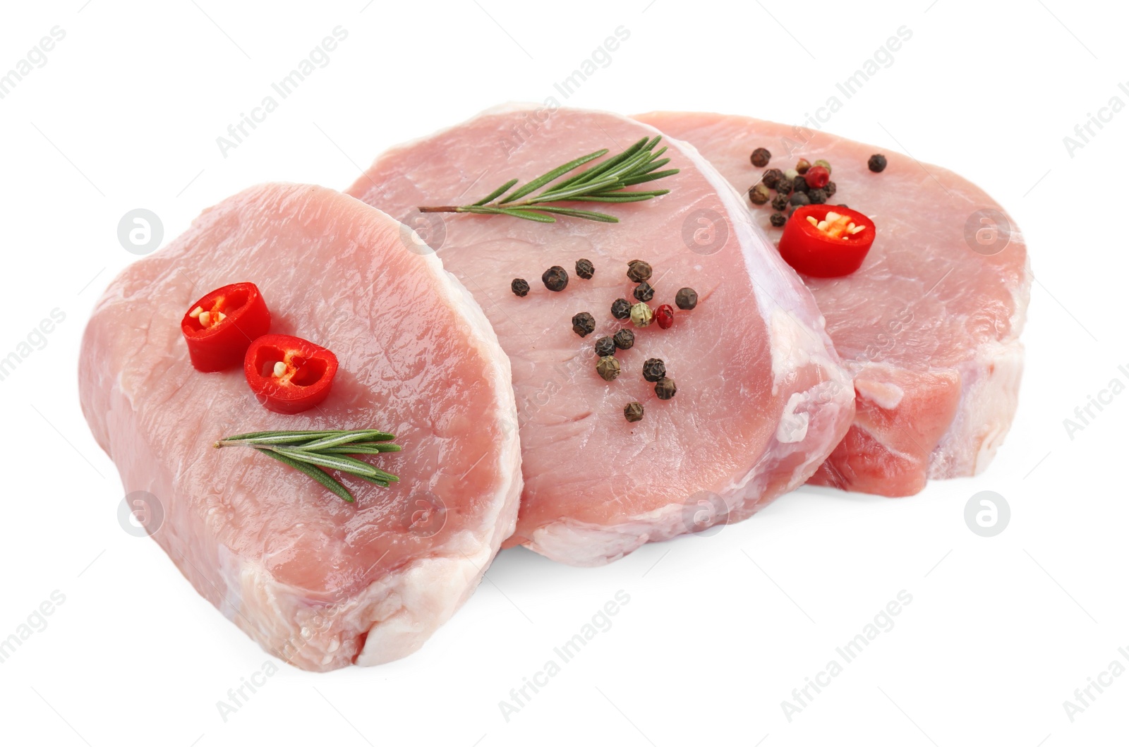 Photo of Pieces of raw pork meat and spices isolated on white