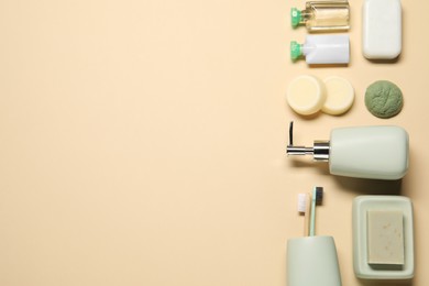 Photo of Bath accessories. Flat lay composition with personal care products on beige background, space for text