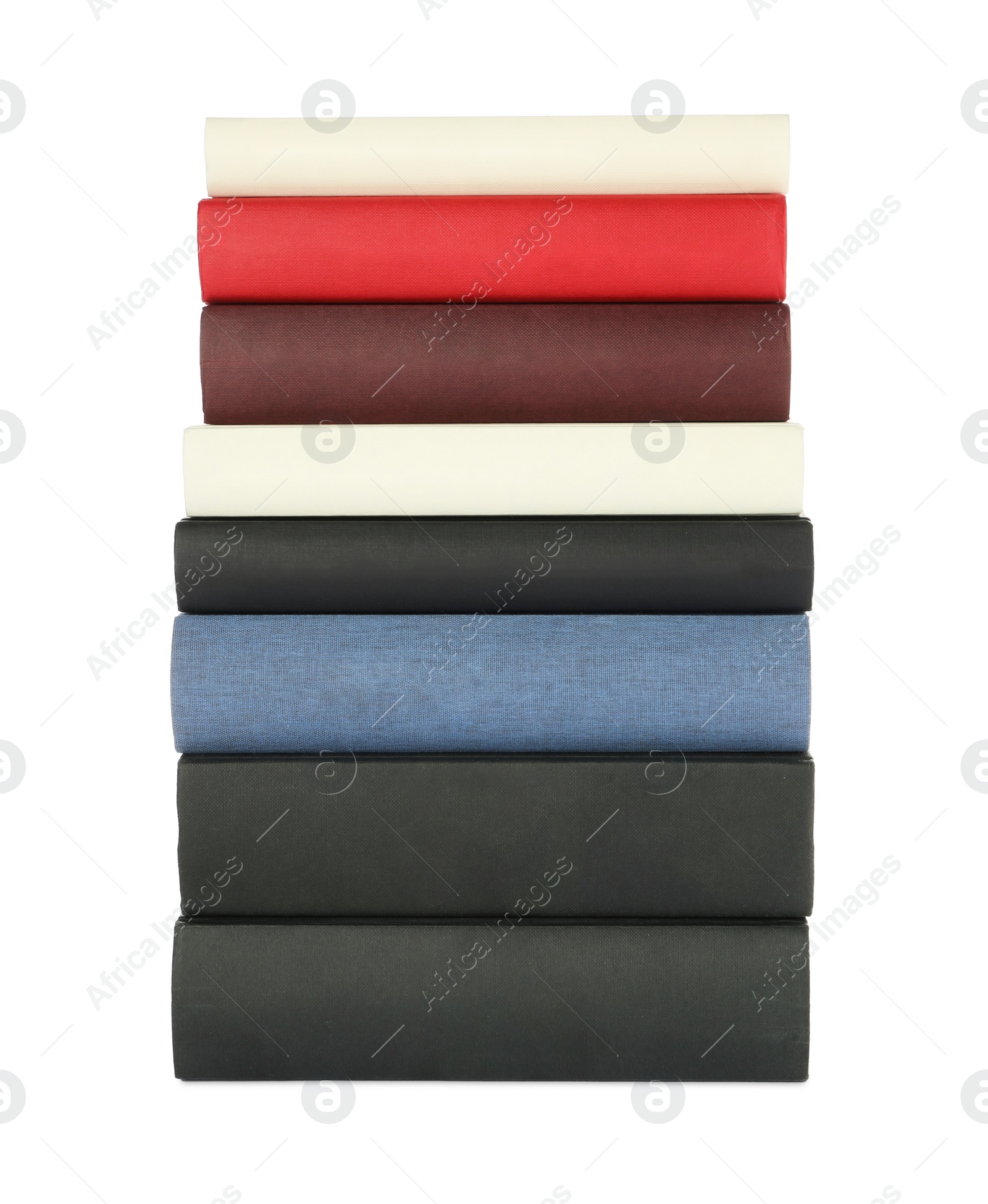 Photo of Many different books stacked on white background