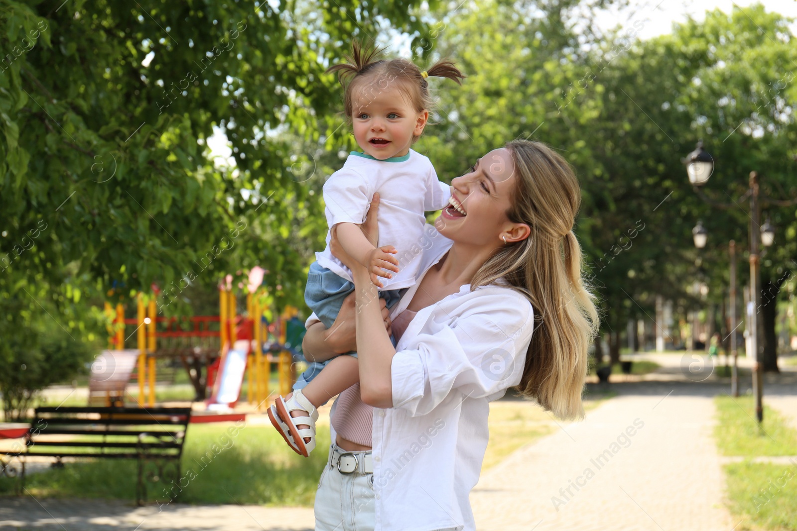 Photo of Happy mother with her daughter spending time together in park