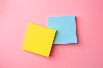 Photo of Blank paper notes on pink background, flat lay