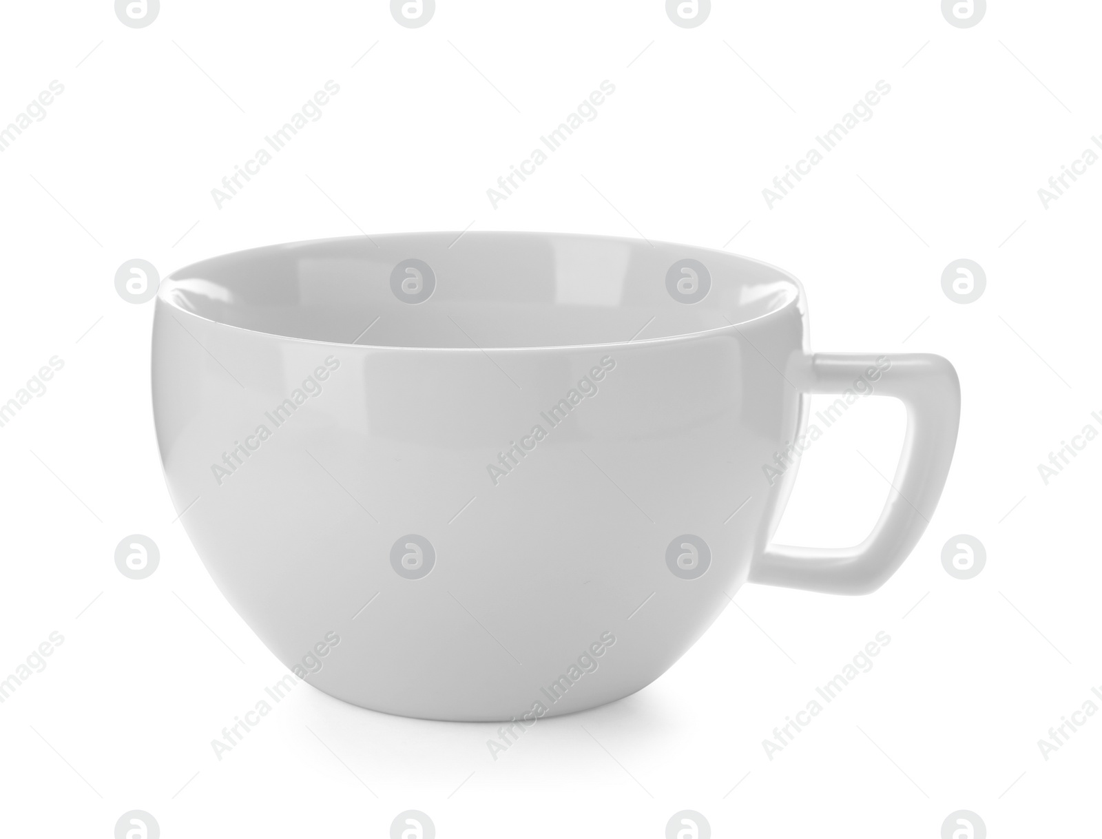 Photo of Empty ceramic cup isolated on white