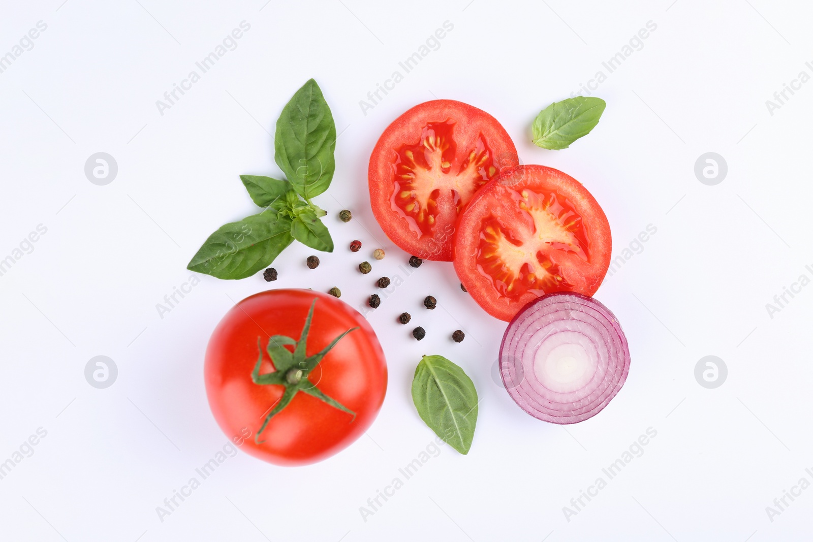 Photo of Flat lay composition with whole and cut tomatoes on white background
