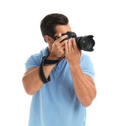 Photo of Young professional photographer taking picture on white background