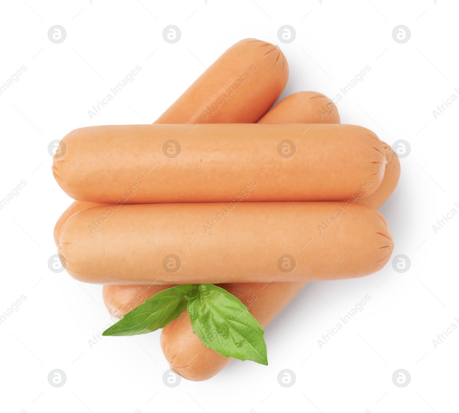 Photo of Many delicious boiled sausages and basil on white background, top view