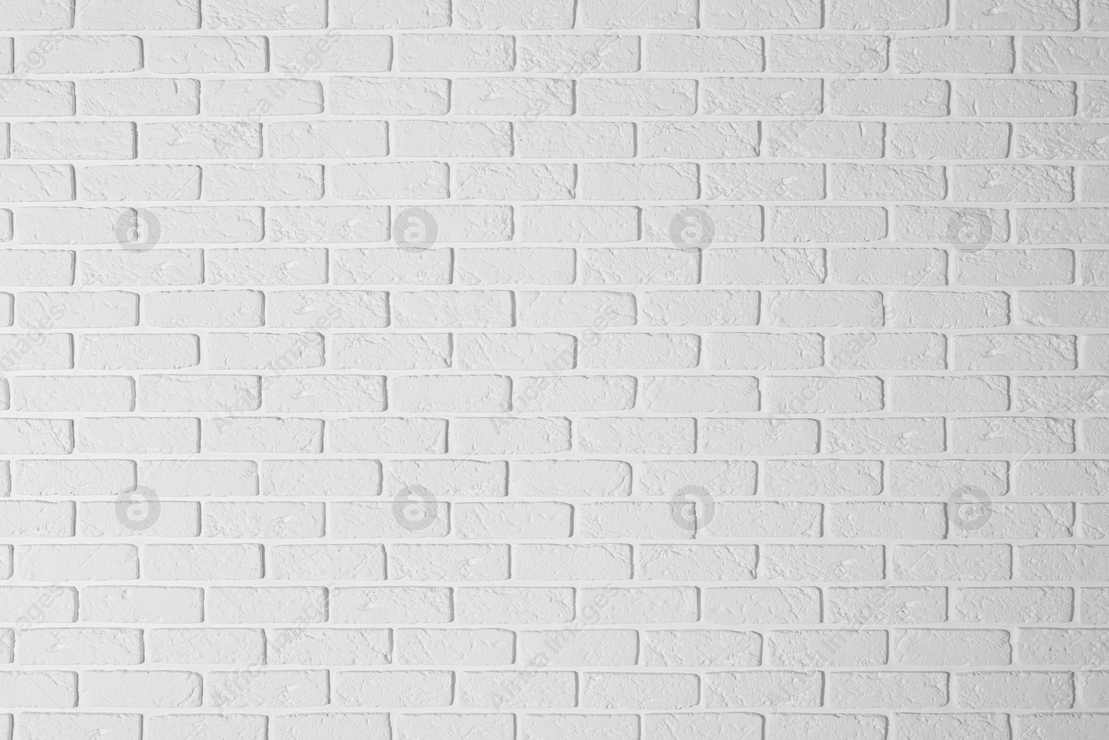 Photo of Texture of white brick wall as background
