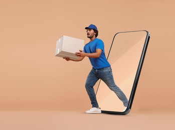 Image of Courier with parcel walking out from huge smartphone on dark beige background. Delivery service