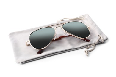 Stylish sunglasses with grey cloth bag on white background