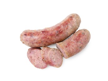 Photo of Tasty whole and cut homemade sausages isolated on white, top view