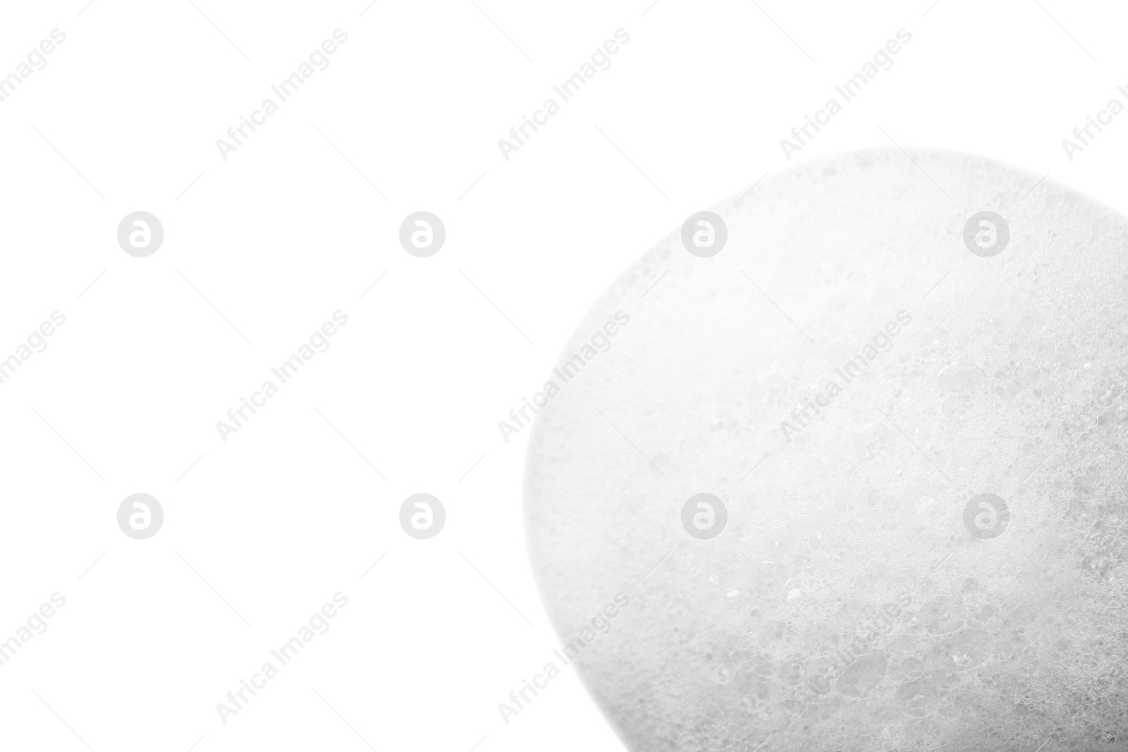 Photo of Drop of fluffy soap foam isolated on white, top view
