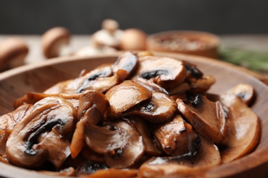 Photo of Plate of tasty fried mushrooms, closeup view