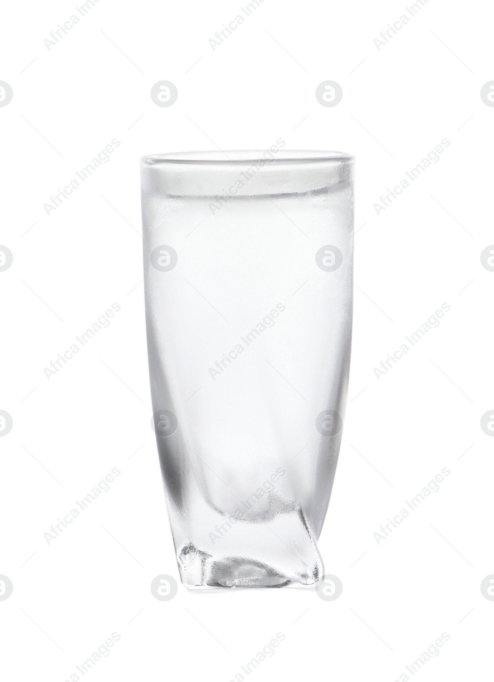 Photo of Shot glass of vodka on white background. Alcoholic drink