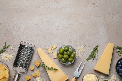 Photo of Flat lay composition with parmesan cheese on grey table. Space for text