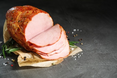 Photo of Delicious ham on grey table, space for text. Christmas dinner