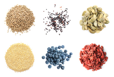 Set of different superfoods on white background, top view