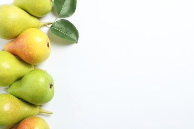 Ripe juicy pears on white background, top view