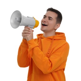 Photo of Special promotion. Young man shouting in megaphone on white background