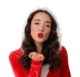 Photo of Beautiful young woman in Christmas red dress blowing kiss on white background