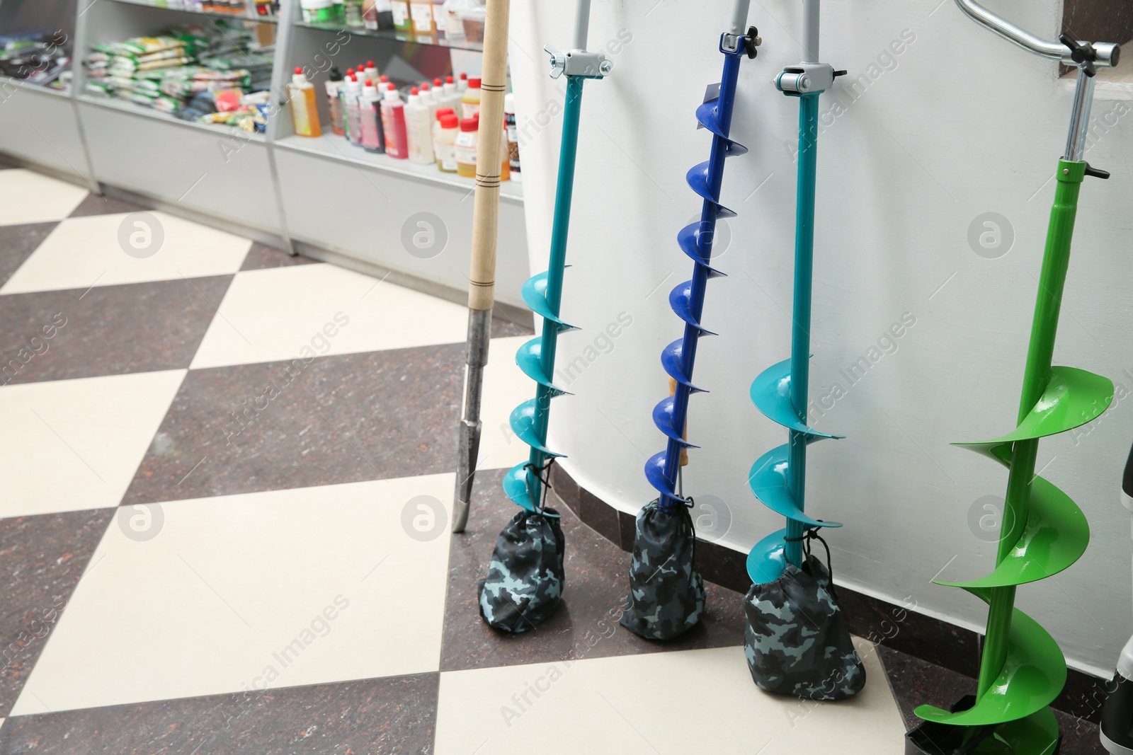 Photo of Fishing equipment on floor in sports shop