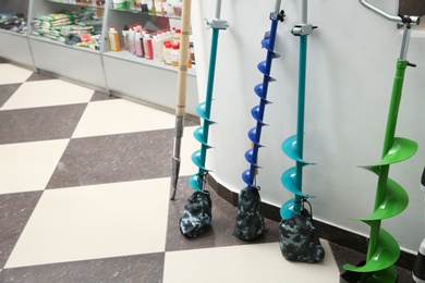 Fishing equipment on floor in sports shop