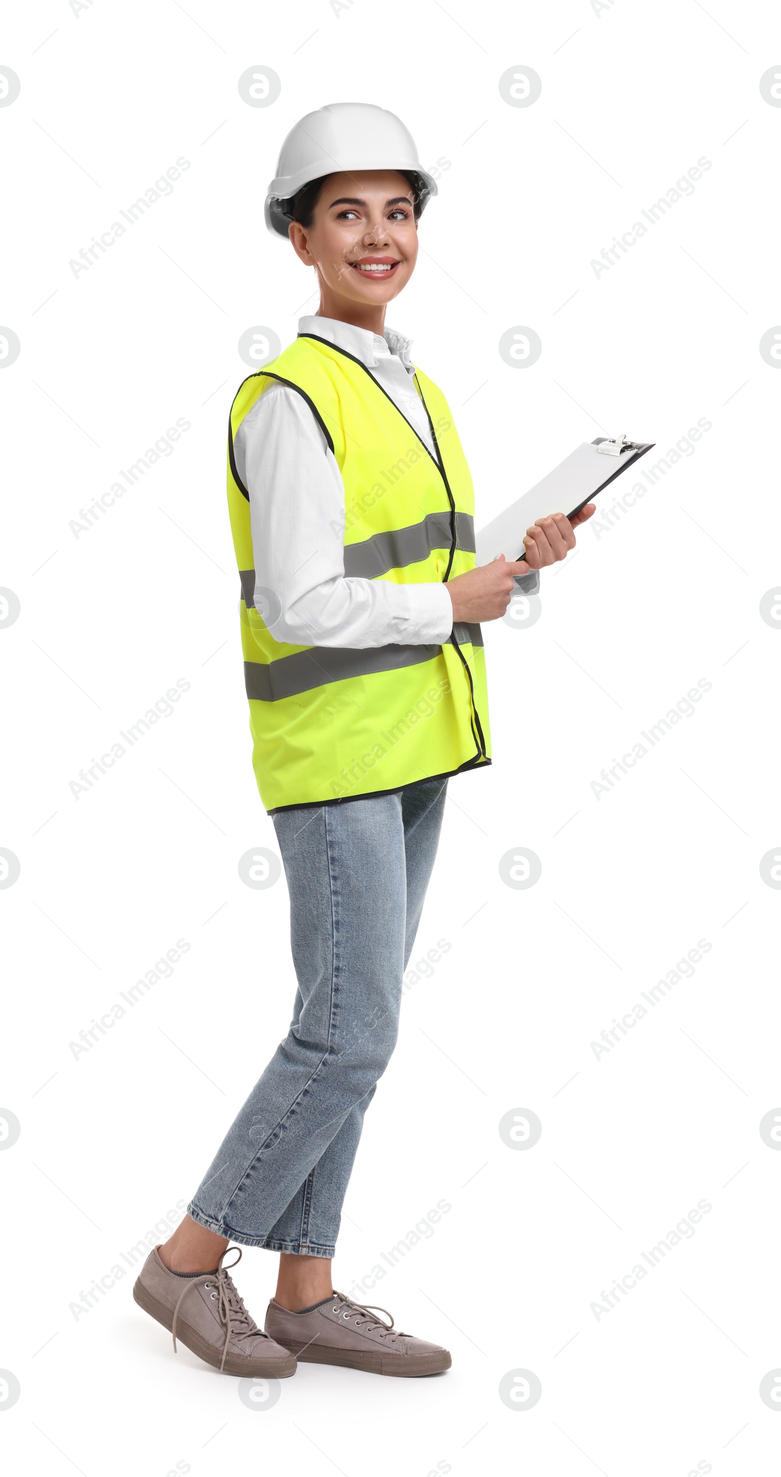 Photo of Engineer in hard hat holding clipboard on white background