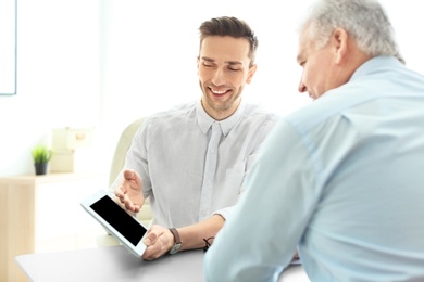 Photo of Human resources manager conducting job interview with applicant in office