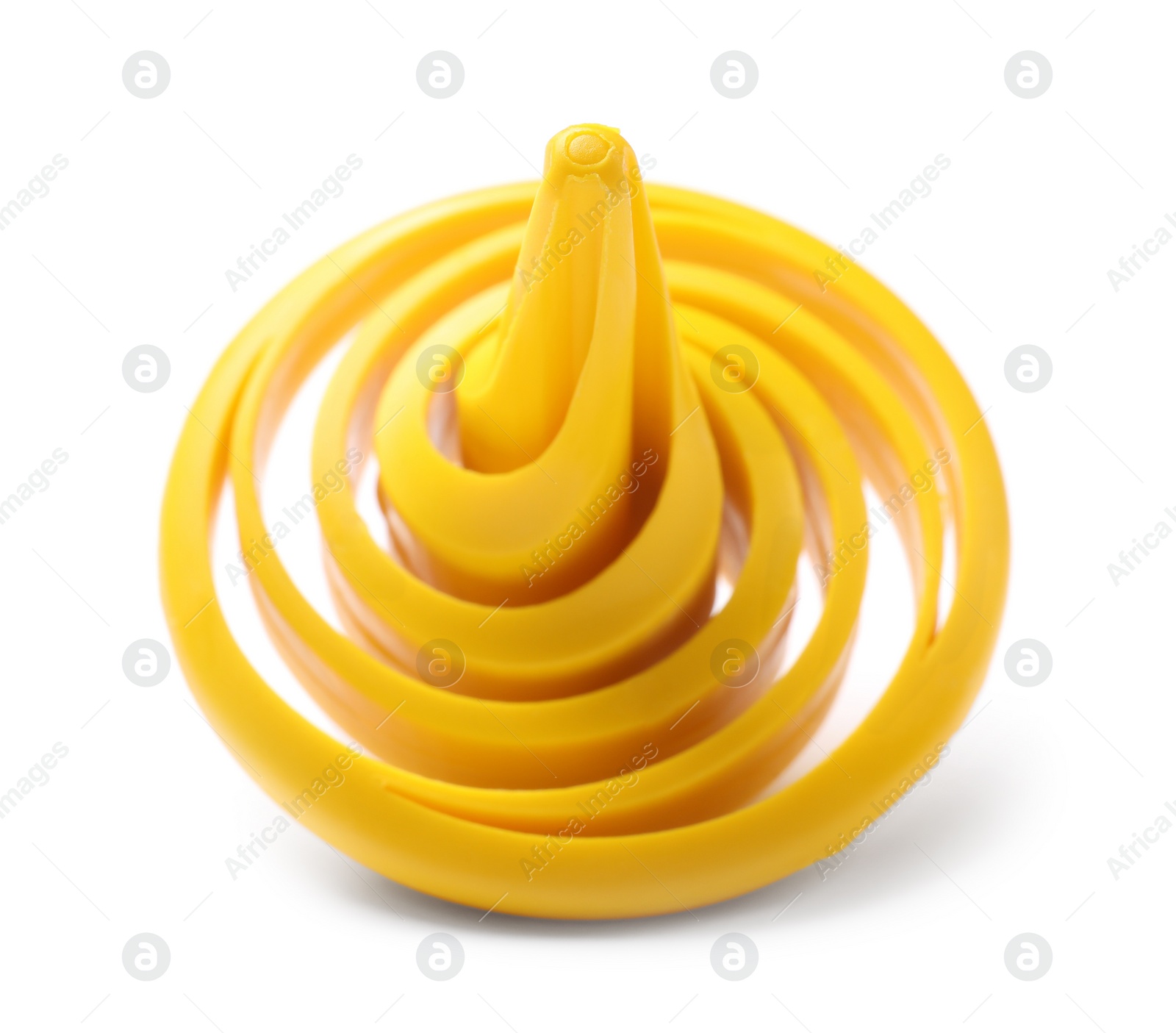 Photo of One yellow spinning top on white background