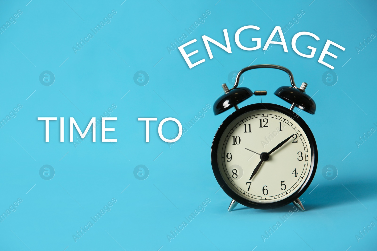 Image of Alarm clock and phrase TIME TO ENGAGE on light blue background