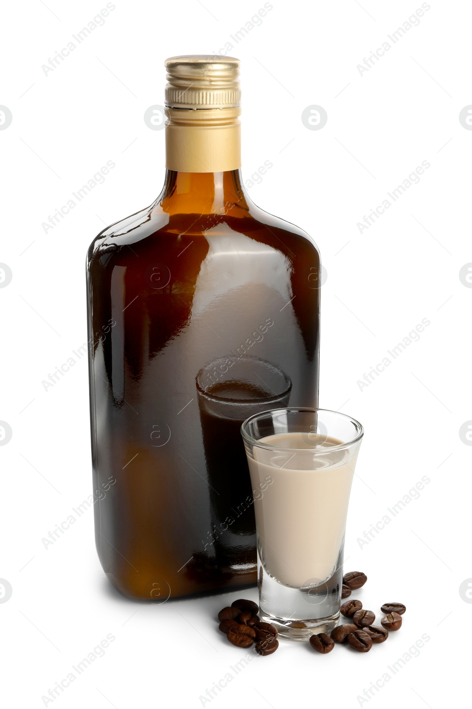 Photo of Coffee cream liqueur in bottle, glass and beans isolated on white