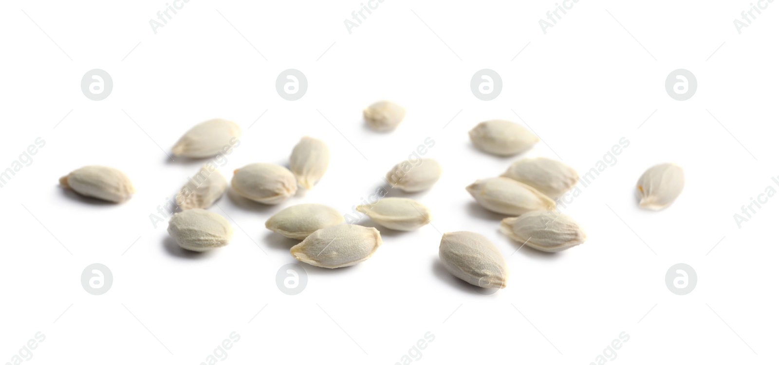 Photo of Many seeds of tangerine isolated on white