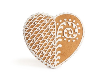 Gingerbread heart decorated with icing isolated on white