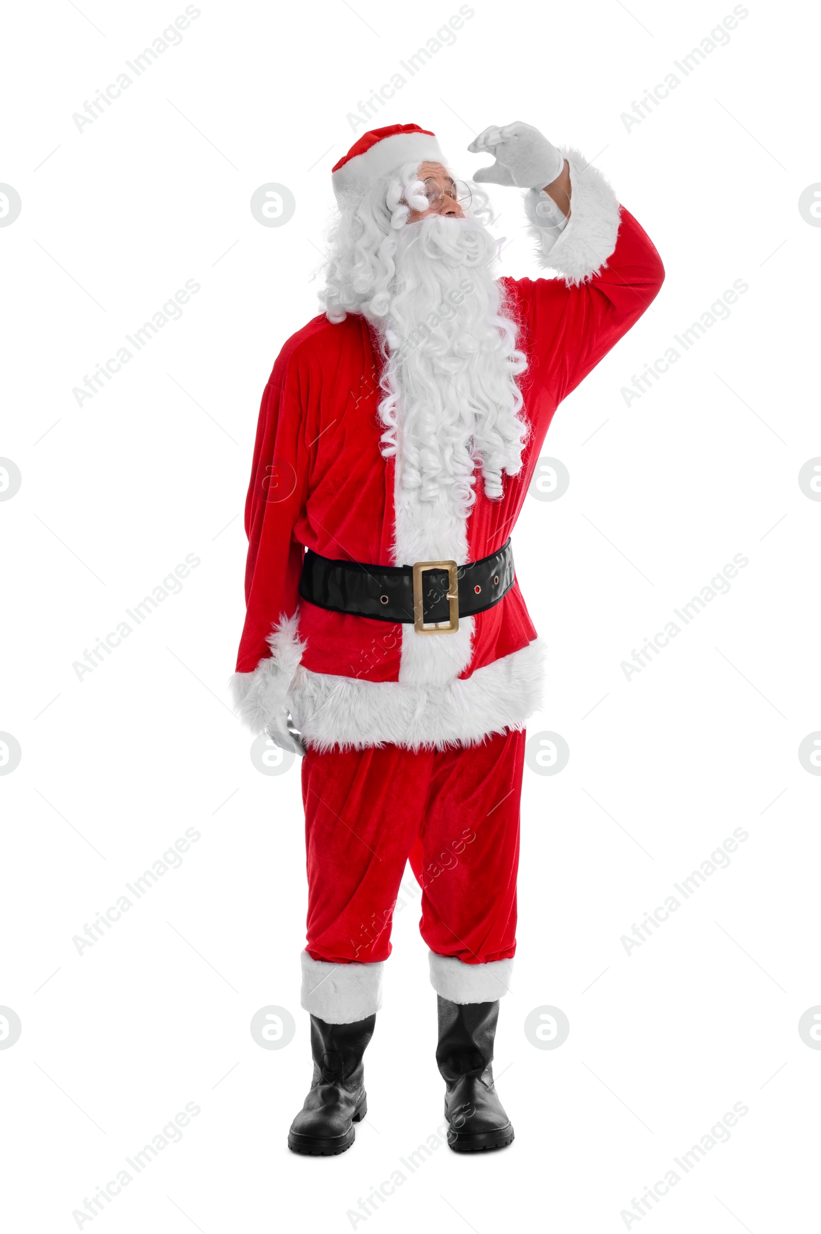 Photo of Man in Santa Claus costume posing on white background