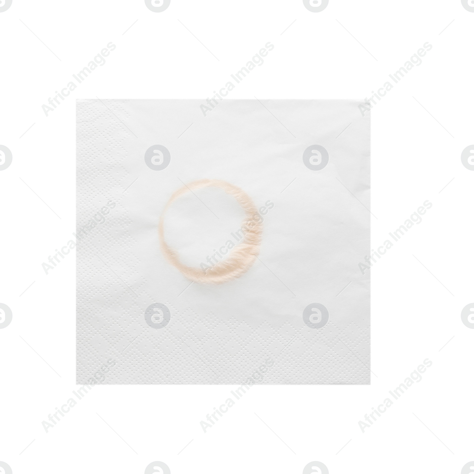 Photo of Paper napkin with coffee stain on white background, top view