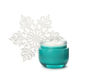 Photo of Jar of cream and snowflake on white background. Winter skin care