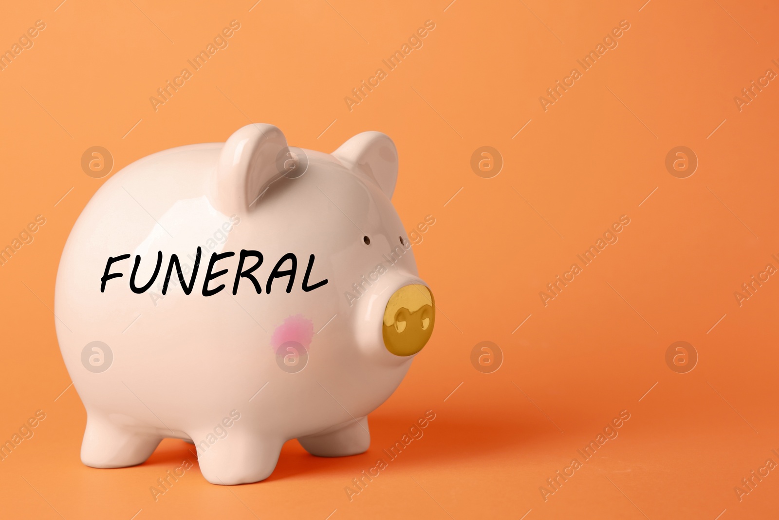 Image of Money for funeral expenses. Pink piggy bank on orange background, space for text