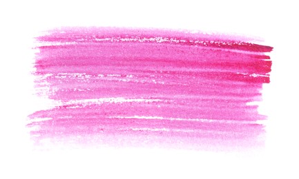 Photo of Pink paint stroke drawn with brush on white background, top view