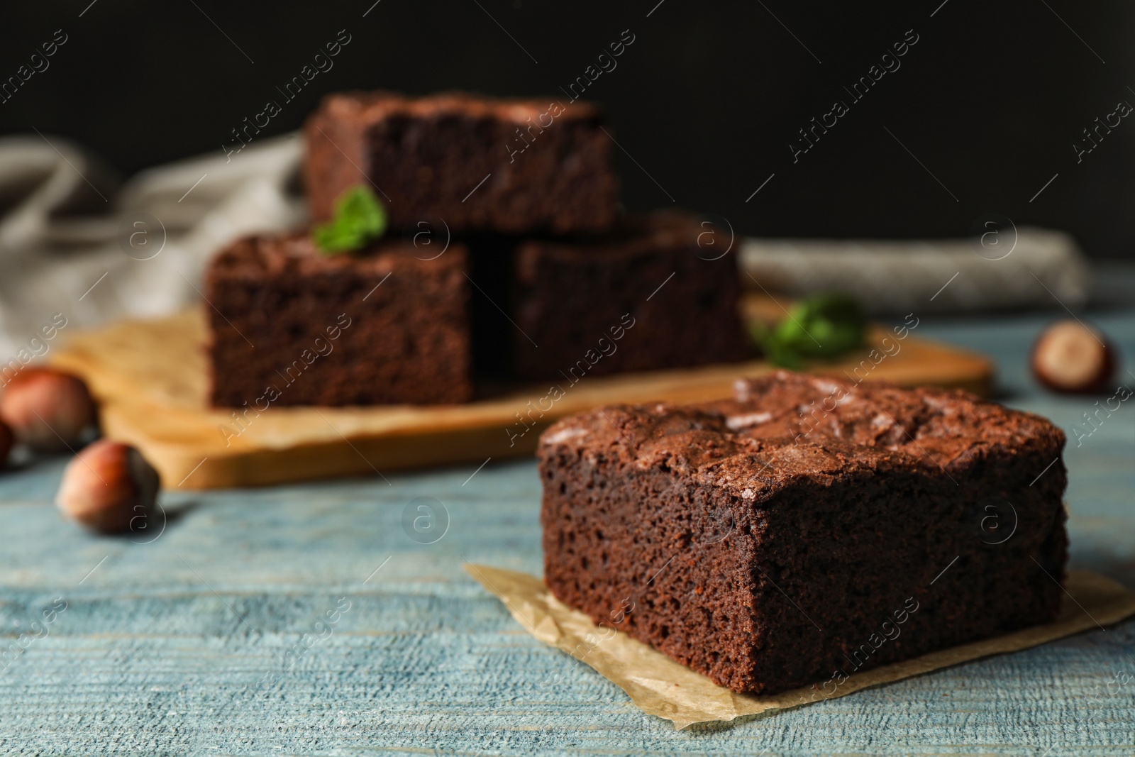 Photo of Fresh brownie on table, space for text. Delicious chocolate pie