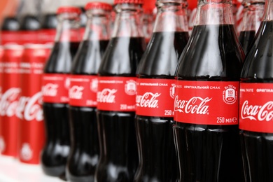 MYKOLAIV, UKRAINE - NOVEMBER 14, 2018: Many bottles of Coca-Cola on display in store