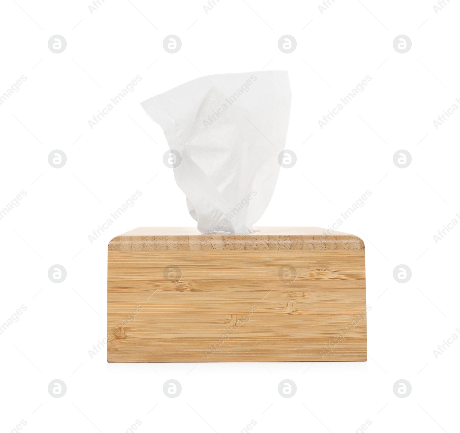 Photo of Wooden holder with paper tissues isolated on white